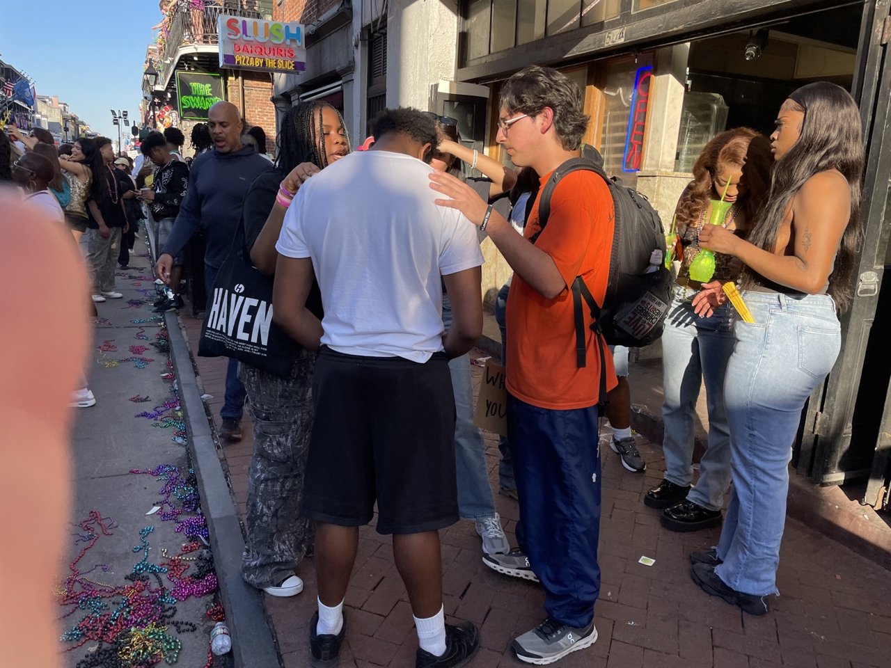 Group prayer on street